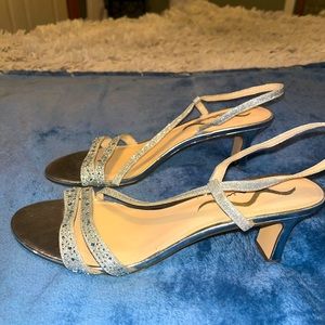 Silver sparkly heels, 1 inch.